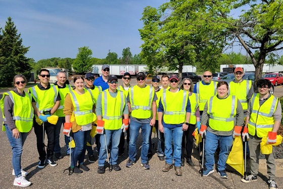 Eagan Community Outreach Gopher Resource Eagan employees in safety vests to pick up trash for adopt-a-highway.
